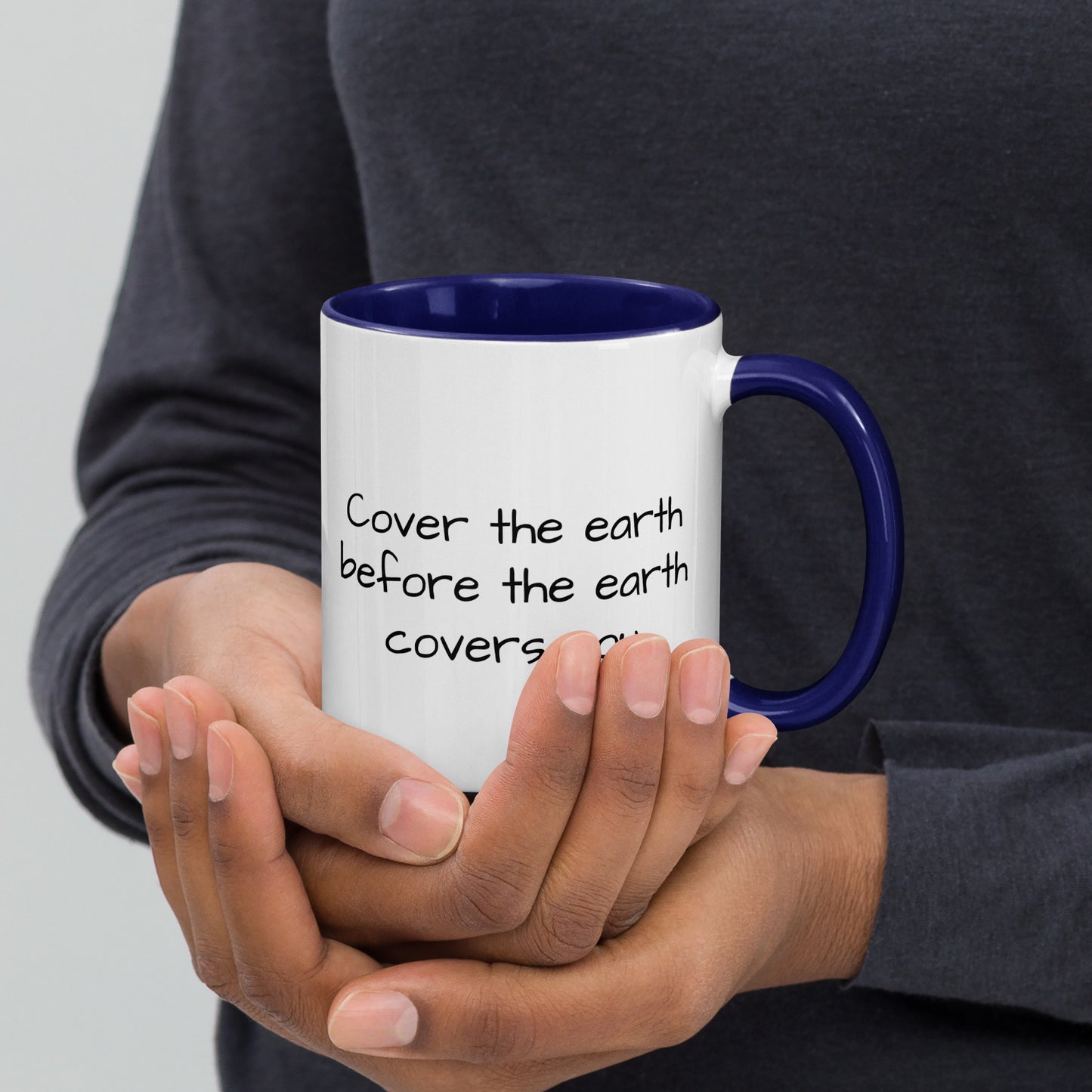 "Cover the earth before the earth covers you." 11oz. coffee mug.